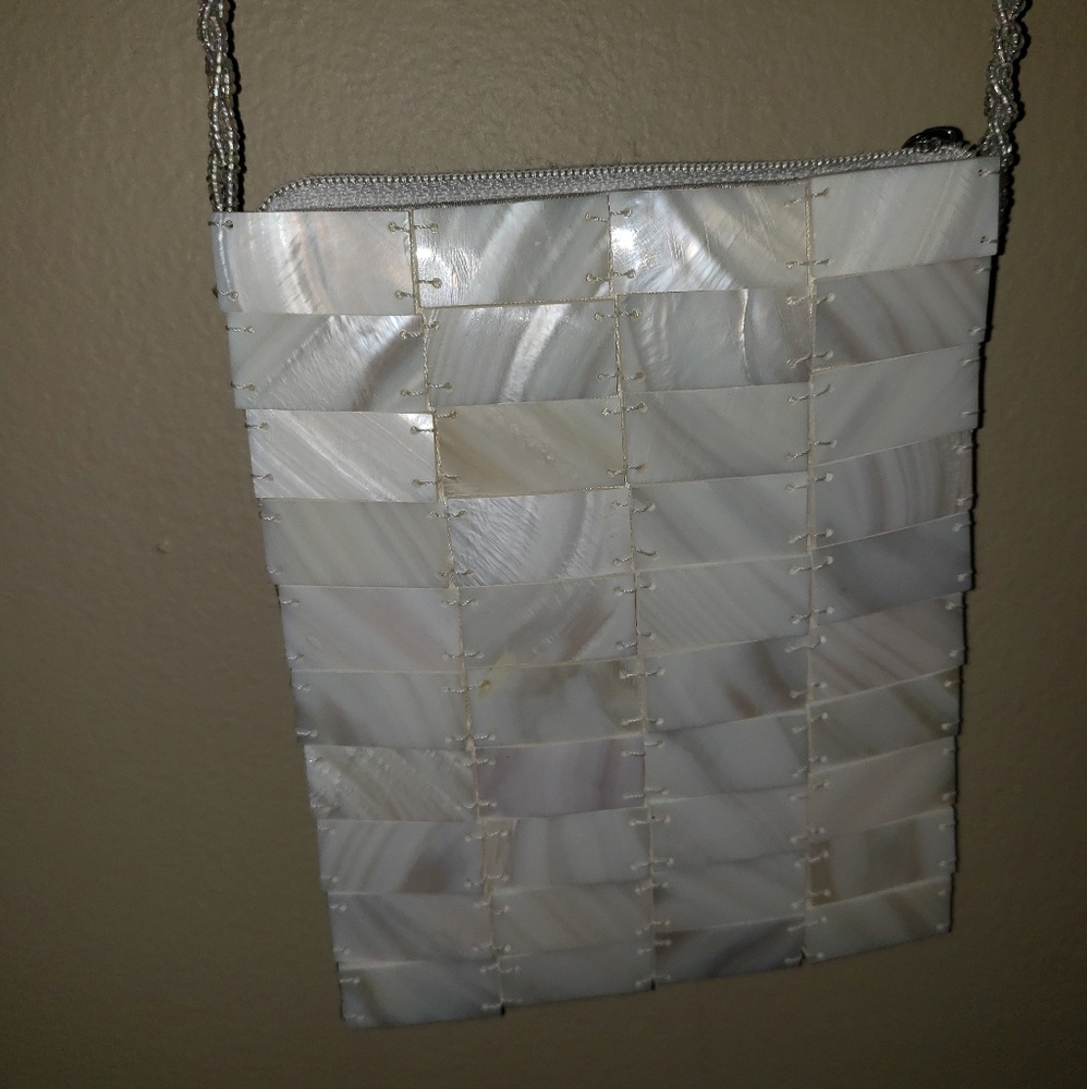 Handmade mother of pearl shoulder Mod by Design